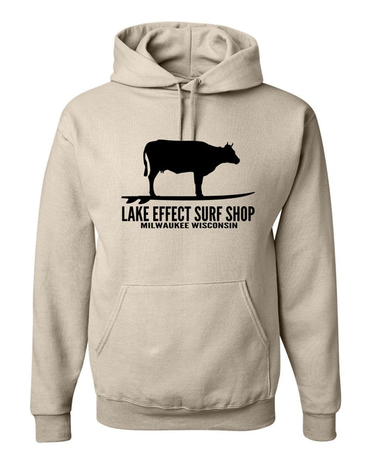 Lake Effect Surfing Cow Unisex Hooded Sweatshirt (Sandstone/Black)